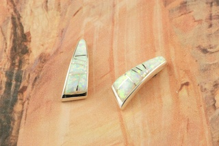 Stunning Fire and Ice Lab Opals inlaid between ribbons of Sterling Silver. Beautiful Sterling Silver Post Earrings feature precision channel inlay. Designed by Navajo Artist Calvin Begay. Signed.